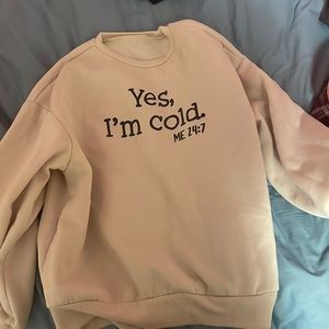 It’s a sweater that’s perfect for winter it says “yes,I’m cold me 24:7”